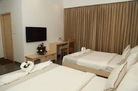 Elevate Your Stay: Serenity & Sophistication Await at Hotel Abis Grand.