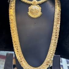 New Karunamurthi Thanga Mazhigai – Where Tradition Meets Purity